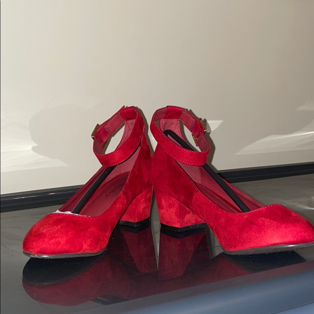 Worn once red heels